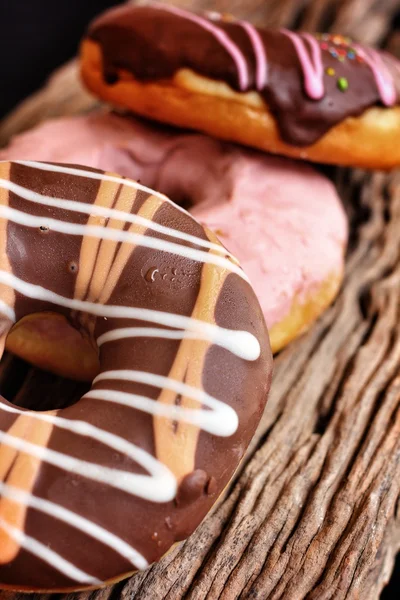 Chocolate and strawberry donuts — Stock Photo, Image