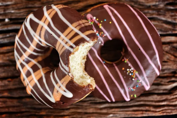 Chocolate and strawberry donuts — Stock Photo, Image