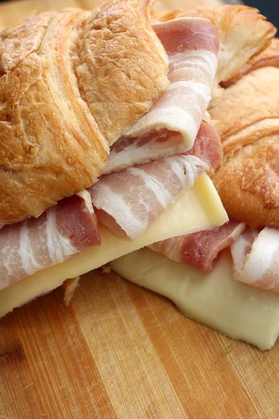 Fresh croissant with ham and cheese — Stock Photo, Image