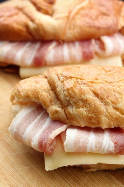 Fresh croissant with ham and cheese — Stock Photo, Image
