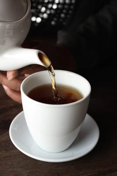 Hot tea on the wood background — Stock Photo, Image