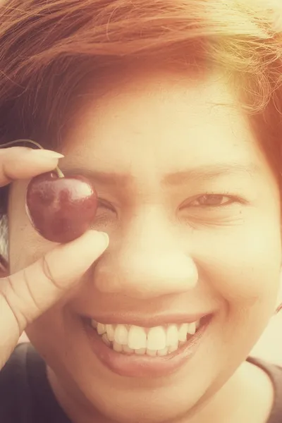 Woman with cherry — Stock Photo, Image