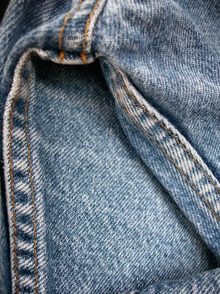 縫い目の背景を持つジーンズ — ストック写真