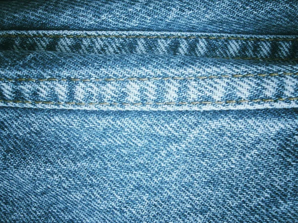 Jeans com costuras fundo — Fotografia de Stock