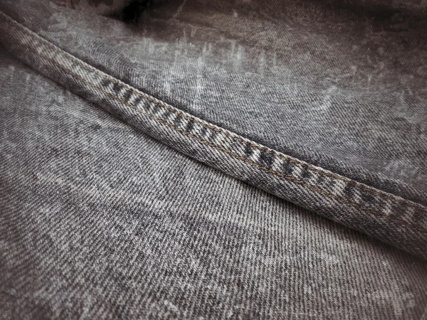 Jeans vintage com costuras fundo — Fotografia de Stock