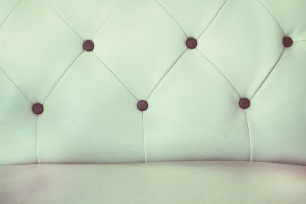 Texture en gros plan du canapé en cuir marron vintage — Photo