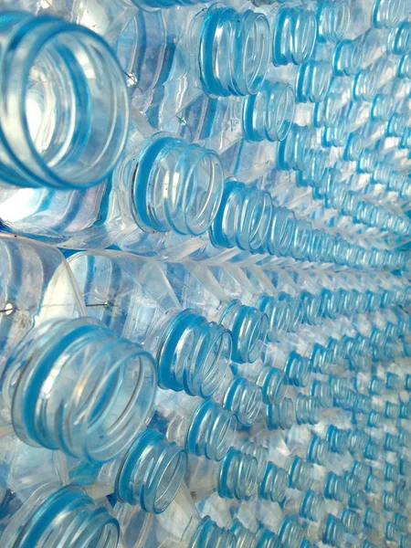 Plastflaskor bakgrund — Stockfoto