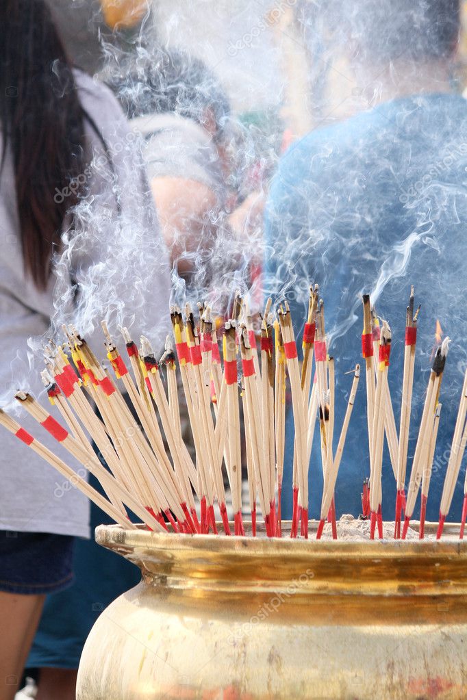 Incense sticks burning at temple — Stock Photo © luknaja 50915387