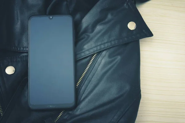 Smart Phone Black Leather Jacket — Stock Photo, Image
