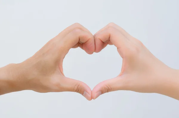 Due mani a forma di cuore — Foto Stock