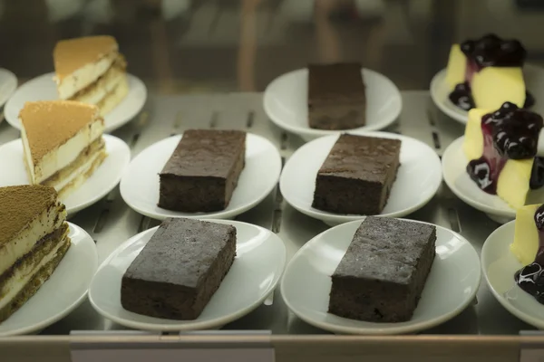 various cake display on white plate