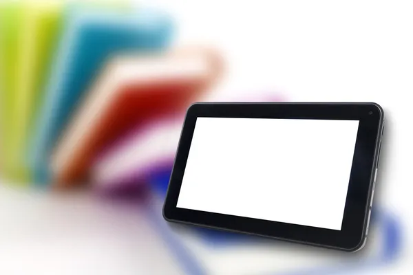 Digitale tablet met boeken blackground — Stockfoto