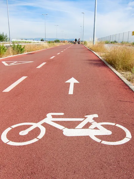 Vias de bicicleta e símbolo de bicicleta branca Fotos De Bancos De Imagens