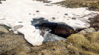 Landscape with green mountains and traditional towns