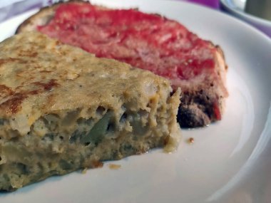 Spanish omelette on a dish (traditional Spanish food)