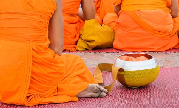 Buddhist monk with alms bowl — Stock Photo, Image