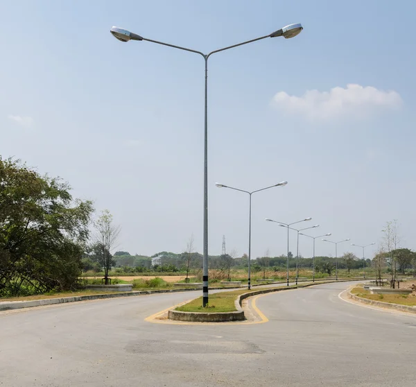 Road with street lights — Stock Photo, Image