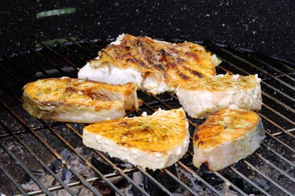 Grilling steak from fish — Stock Photo, Image