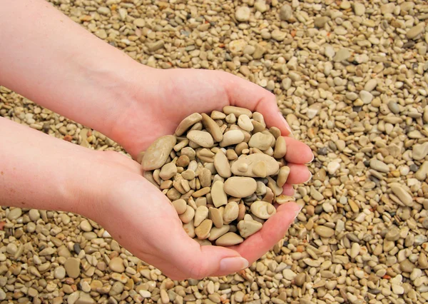 Hand with stones — Stock Photo, Image