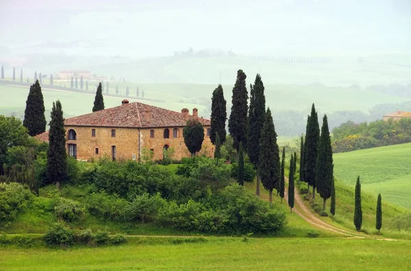 Tuscany house in fog — Stock Photo, Image