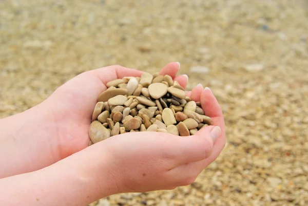 Hand with stones — Stock Photo, Image