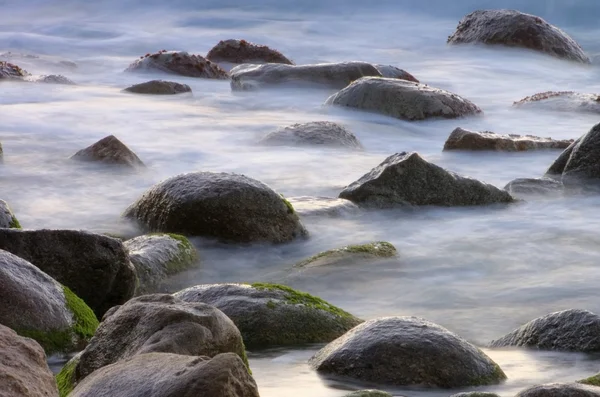 Rocks in surf — Stock Photo, Image