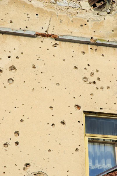 Holes in the wall of bullets — Stock Photo, Image