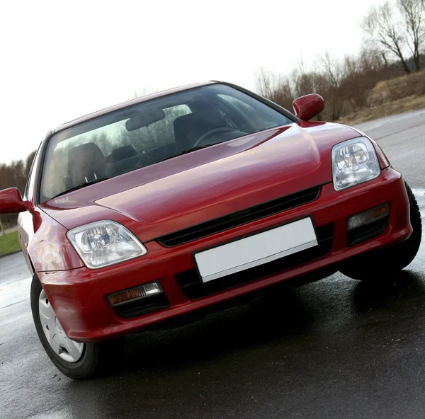 front view red car