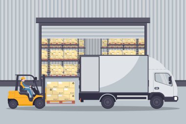 Industrial warehouse for the storage of products. Worker driving forklift loading pallets to refrigerator truck. Industrial storage and distribution of products