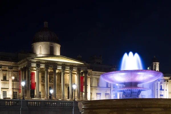 Trafalgarské náměstí v noci — Stock fotografie