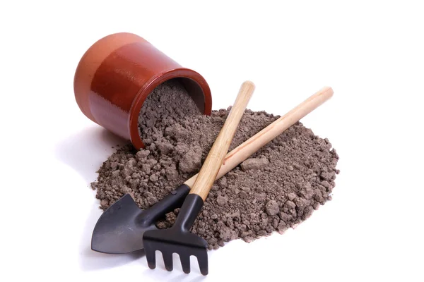 Soil, tools and ceramic pot — Stock Photo, Image