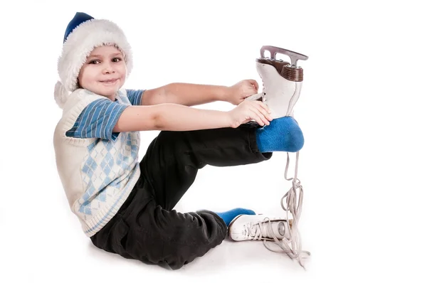 Boy with skates, insulated background — Stock Photo, Image