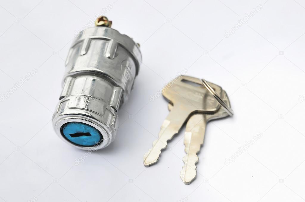 Electronic ignition lock with keys on an isolated background