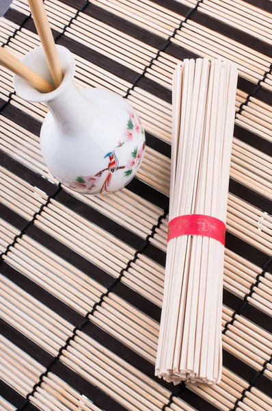 Chinese noodles on the mat — Stock Photo, Image