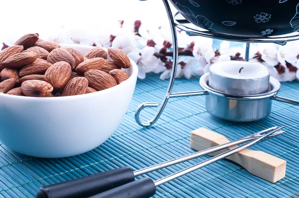 Chocolate fondue with nuts — Stock Photo, Image