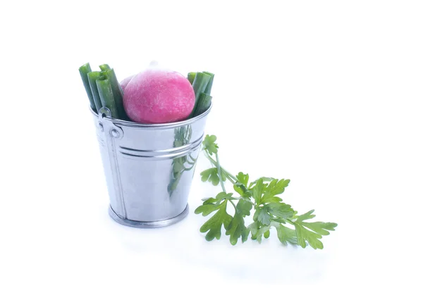 Fresh radish in a bucket isolated on white background — Stock Photo, Image