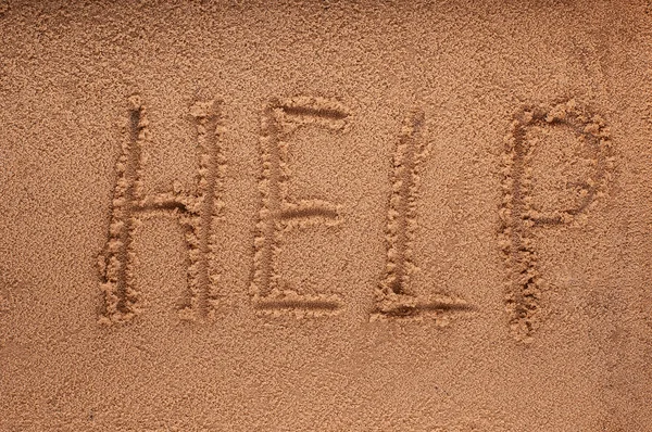 Help Sign on the beach — Stock Photo, Image
