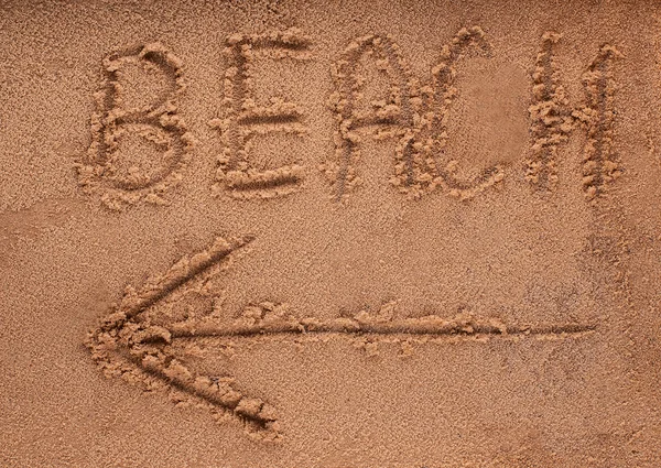 Slogan på en sand. gå till stranden. — Stockfoto