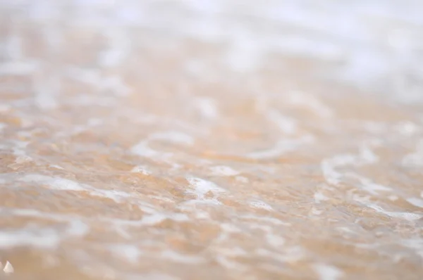 Sea wave over sand — Stock Photo, Image