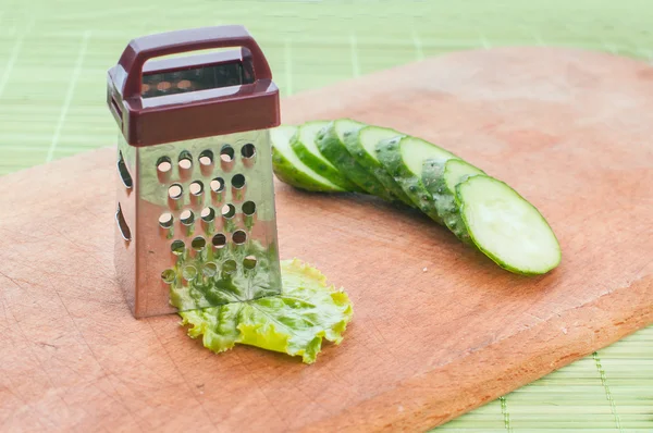 Vegetables and grater — Stock Photo, Image