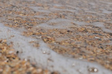 dalga deniz kum üzerinde