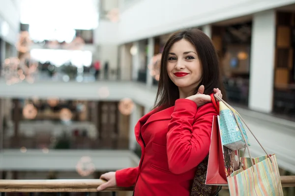 Drei schöne Mädchen mit Shopping Stockbild