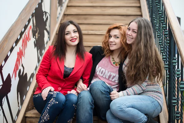 Three beautiful girls with shopping — Stock Photo, Image