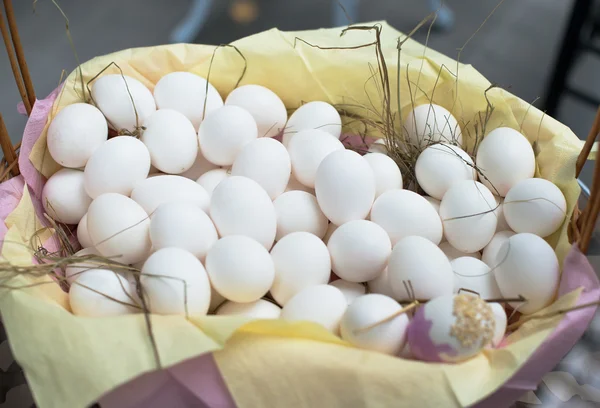 White eggs in basket — Stock Photo, Image