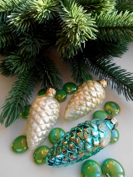 Christmas decoration firtree and pine cones — Stock Photo, Image