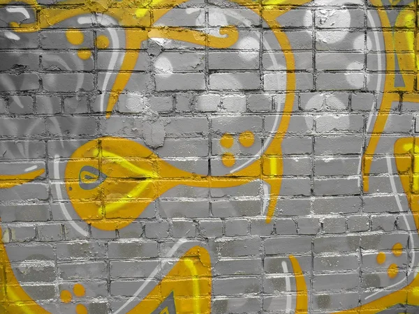 Γκράφιτι σε τοίχο φόντο τούβλο — Φωτογραφία Αρχείου