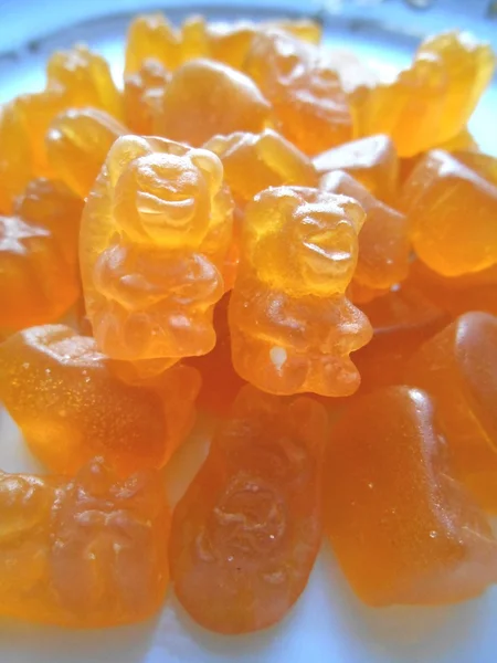 질긴 사탕 주황색 배경 — 스톡 사진
