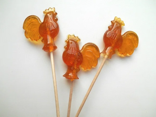 Сandy lollipops on a stick cock — Stock Photo, Image