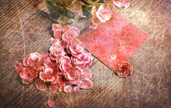 Vintage heart från blommor på träbord — Stockfoto