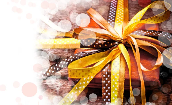 Holidays present with bow from atlas ribbon — Stock Photo, Image